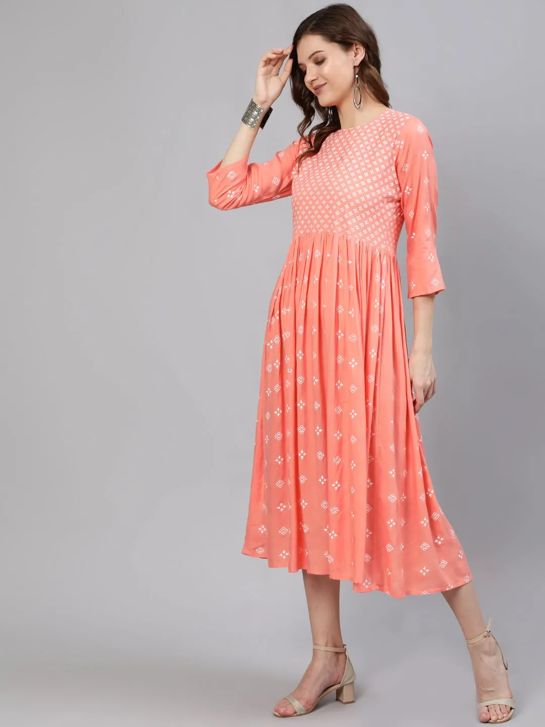 Women Peach Printed Dress With Three Quarter Sleeves