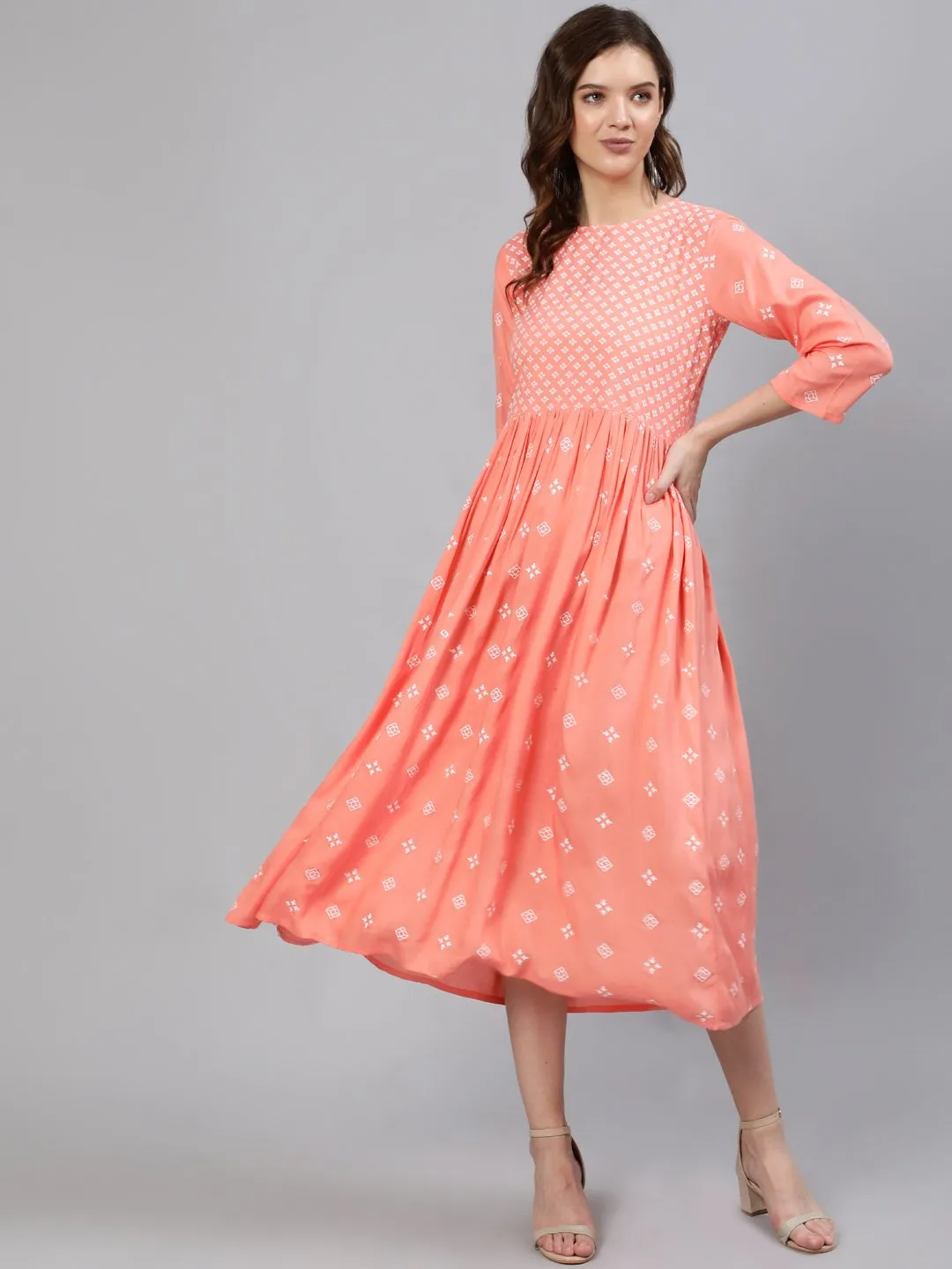 Women Peach Printed Dress With Three Quarter Sleeves